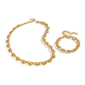 Two-tone stainless steel jewelry set with heart chain necklace and matching bracelet
