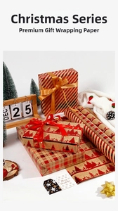 Detail of Christmas gold stamping kraft wrapping paper with red ribbons and pine cones