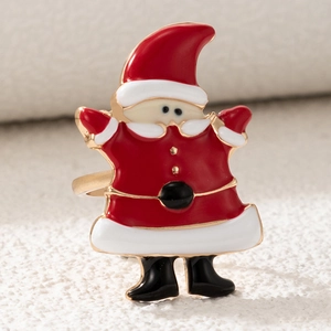 Detailed view of Santa Claus enamel ring with red and white drip oil on golden alloy