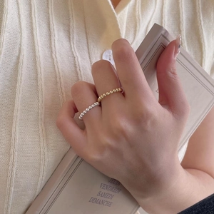 Minimalist 925 sterling silver beaded open rings in gold and silver finish on hand