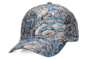 Detailed close-up of premium metallic jacquard baseball cap with gold marble pattern