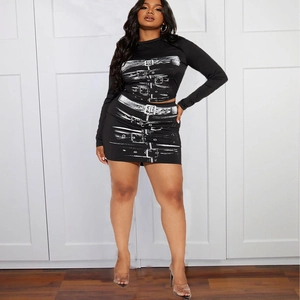Detail of two-piece set featuring long-sleeve crop top and skirt with belt buckle print