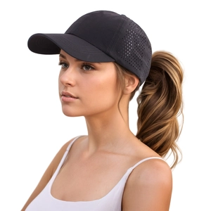 Detail of black quick-dry baseball cap with laser-cut side vents for high breathability