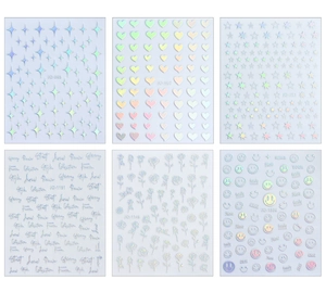 Holographic nail stickers featuring star heart and rose laser designs for manicure art