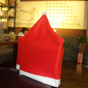Christmas Santa hat chair covers in red and white non-woven fabric for holiday decor