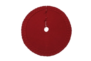 Detail of 48 inch deep red knitted Christmas tree skirt with braided edge and ties