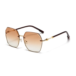 Fashion rimless oversized sunglasses with brown gradient lenses and gold metal frames