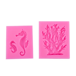 Pink silicone fondant molds set featuring detailed seahorse and coral sea life designs