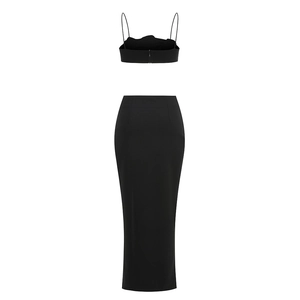 Rear view detail of black two-piece set featuring a back zipper and slim fit pencil skirt