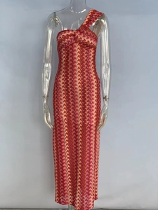 Detail of one-shoulder neckline and geometric zigzag print on a slim maxi dress