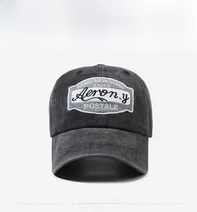 Front view of vintage washed charcoal baseball cap with Aero New York 1985 embroidery