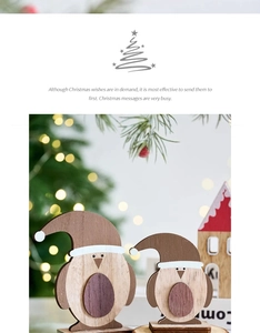 Detail of wooden Christmas bird decoration with Santa hat and rustic home festive decor