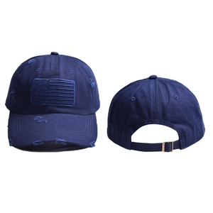 Detail of navy vintage flag baseball cap showing embroidery and distressed fabric