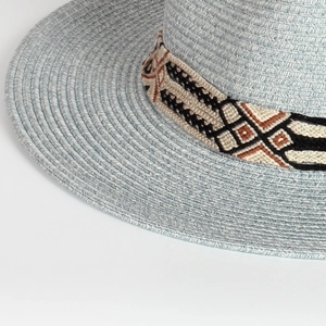 Light blue straw sun hat featuring a bohemian geometric embroidered ethnic band