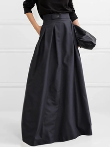 Elegant high waist navy blue pleated maxi skirt with button detail and smooth fabric finish