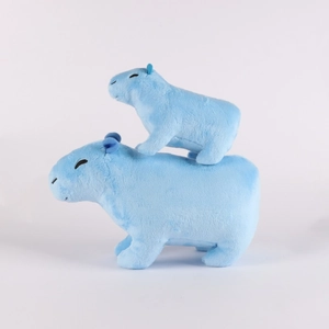 Blue plush capybara toys in large and small sizes stacked on a white background