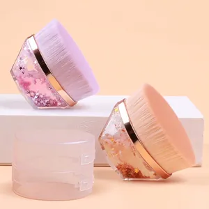 Portable magic foundation brush with diamond handle and soft bristles in pink and purple
