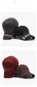 Detail of embroidered vintage baseball caps in black, grey, burgundy and brown colors