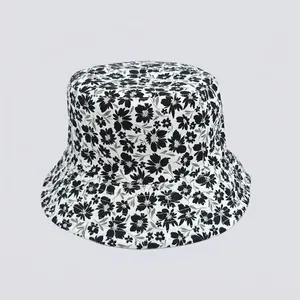 Close-up of black and white floral digital print on a canvas bucket hat for women