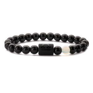 Tierkreiszeichen Waage Perlenarmband mit polierten schwarzen Perlen und Astrologie-Charm