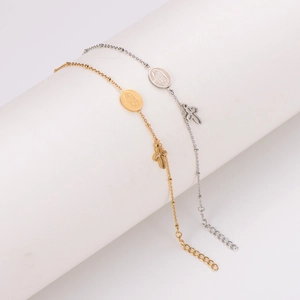 Minimalist gold and silver beaded bracelets with Virgin Mary medal and cross pendants
