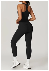Rear view of racerback tank top and high-waist leggings in matte black sportswear set