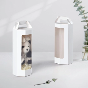Minimalist white octagonal gift box with handle and transparent window for packaging