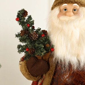 Standing Santa Claus doll in red and brown festive outfit with pine cone detail