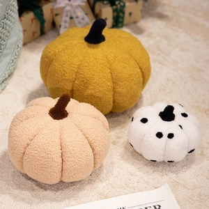 Plush pumpkin pillows in yellow, beige and polka dot for cozy home decoration