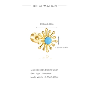 Detail of 925 sterling silver golden sun stud earrings with round turquoise stone