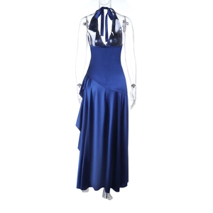 Detail of navy blue satin backless dress featuring a stylish halter neck with bow tie closure
