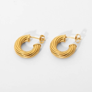 Detailed view of 18K gold plated stainless steel earrings with twisted thread texture