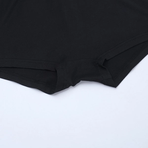 Close-up of high-quality stitching and knit texture on black lace three-piece set shorts