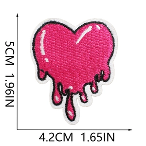 Close-up of pink dripping heart embroidered patch showing dimensions 5cm by 4.2cm