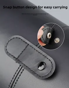 Detail of professional makeup brush bag with durable stainless steel snap button closure