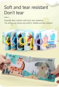 Detail of soft polyester baby cloth books with colorful rings and animal patterns