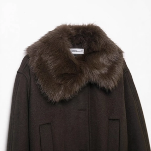 Women's dark brown jacket featuring a thick faux fur collar and classic vertical pockets