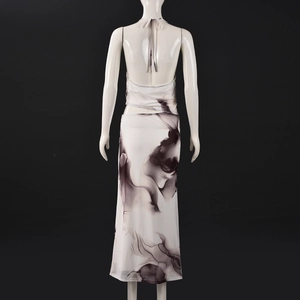 Detail of the back tie closure and ink print pattern on white sleeveless maxi dress