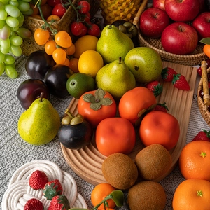 Variety of realistic artificial fruits like apples and grapes for home decor and props