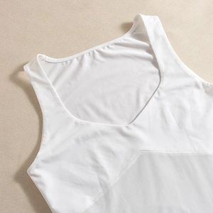 Close-up of white V-neck sleeveless top featuring breathable mesh paneling and soft fabric