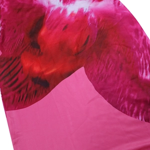 Close-up of pink and magenta tie-dye texture on soft summer dress chiffon fabric