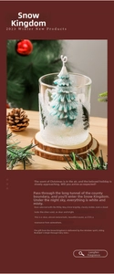 Close-up of a blue and white Christmas tree candle in a glass jar with a pine cone decor