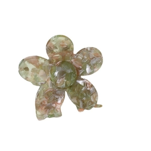 Elegant flower-shaped acetate hair claw clip with amber and green marble pattern