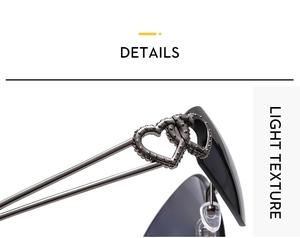 Close-up of Y2K rimless sunglasses featuring double heart buckle and bead textures