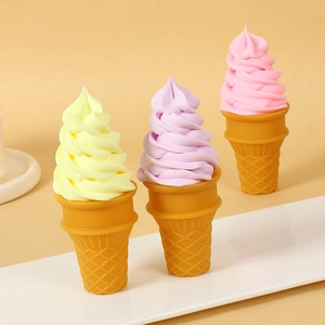 Three realistic pastel artificial ice cream cones in light yellow, purple and pink colors