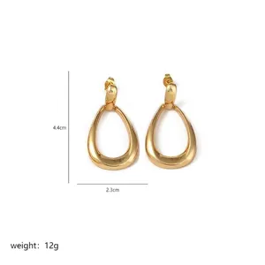 Detailed view of gold water-drop earrings measuring 4.4cm by 2.3cm with 12g weight