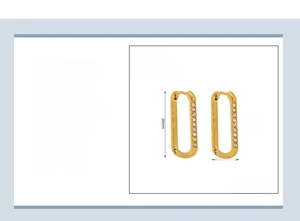 Detail view of gold U-shaped earrings with rhinestone inlay and 20x13mm dimensions