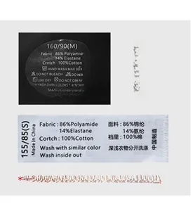Care label detail of ice silk thong showing 86% polyamide and 100% cotton crotch lining
