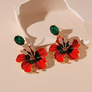 Boucles d'oreilles fleur vintage en émail rouge avec pierre précieuse verte