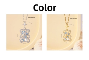 Detail view of bear pendants with blue and white zircons in gold and silver finishes